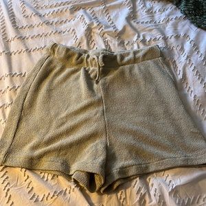 Beige mesh material shorts